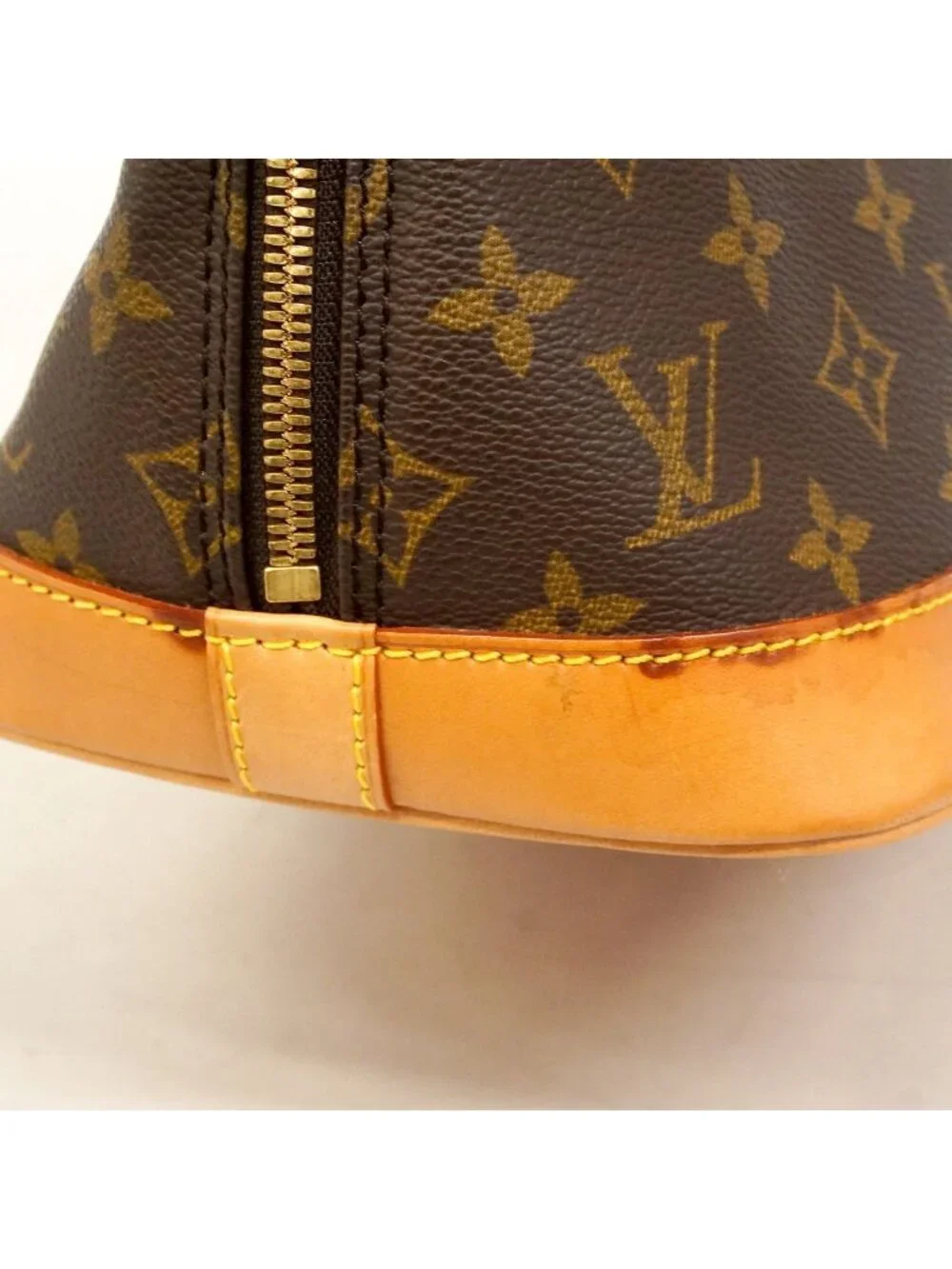 Louis Vuitton Monogram Alma Brown Handbag